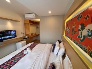Rúm í herbergi á ViaVia Boutique Hotel - Kathmandu
