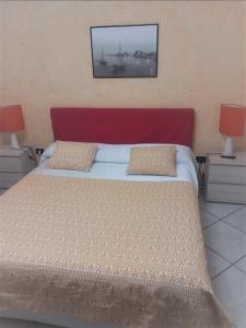 Postel nebo postele na pokoji v ubytování B&B Casa Vacanze La Mimosa Alghero