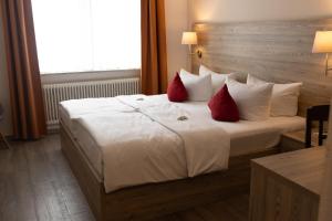 Postel nebo postele na pokoji v ubytování Hotel Kübler