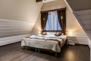 Posteľ alebo postele v izbe v ubytovaní Chata Walczaków -Blue Cave Cottage + 30 fotografií