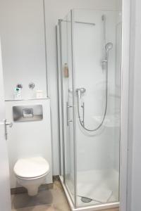 Koupelna v ubytování Hotel Kübler + 31 fotografií