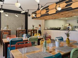 Reštaurácia alebo iné gastronomické zariadenie v ubytovaní H10 Mediterranean Village