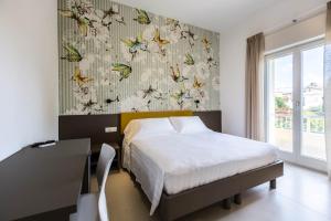 Postel nebo postele na pokoji v ubytování Casa Rita