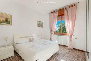 Posteľ alebo postele v izbe v ubytovaní Villa Pina