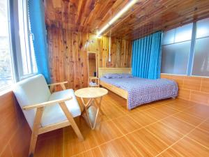 Postel nebo postele na pokoji v ubytování Vườn của mẹ