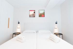 Postel nebo postele na pokoji v ubytování Sholeo Lodges La Cícer Flats