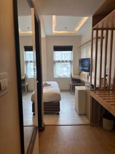 Rúm í herbergi á ViaVia Boutique Hotel - Kathmandu