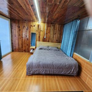 Postel nebo postele na pokoji v ubytování Vườn của mẹ
