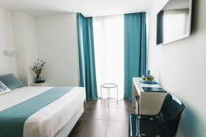 Uma cama ou camas num quarto em Hotel 54 Barceloneta