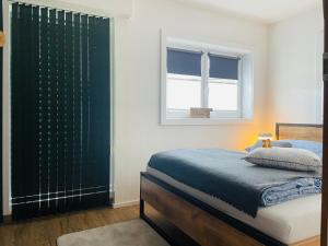 Voodi või voodid majutusasutuse Apartment WEITBLICK toas