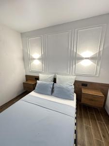 Giường trong phòng chung tại Loft apartment +14 ảnh