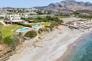 an aerial view of a beach with a resort at Paradise Beach II in Kiotari