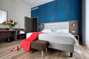 Postel nebo postele na pokoji v ubytování Hotel Concord