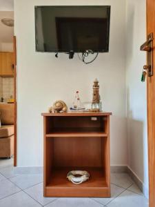 Televisyen dan/atau pusat hiburan di Apartments Manuel