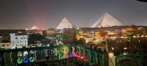 Снимка в галерията на Pyramids Temple Guest House в Кайро