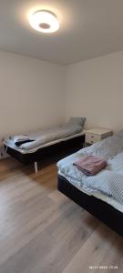 Voodi või voodid majutusasutuse Sleepindenmark toas