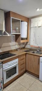 Kuchyň nebo kuchyňský kout v ubytování Apartamento 2ª Línea-Oropesa del Mar