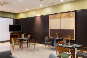 TV a/nebo společenská místnost v ubytování Hotel Ciudad de Valladolid