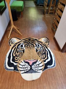 a tiger rug on the floor in a room at Alojamiento San Francisco Espaciosos y lindos mini apartamentos in Lima