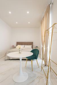 A bed or beds in a room at Quattro Perle