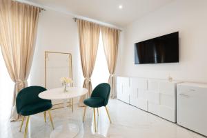 A television and/or entertainment centre at Quattro Perle