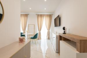 A television and/or entertainment centre at Quattro Perle