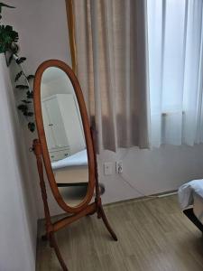 Postel nebo postele na pokoji v ubytování Woodri House