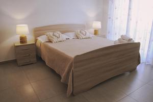 Postel nebo postele na pokoji v ubytování B&B Santa Filomena