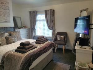 Prostor za sedenje u objektu Stunning 2-Bed House in Macclesfield Cheshire