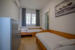Posteľ alebo postele v izbe v ubytovaní Villa Elin - Private Pool & Peaceful Family Retreat near Omiš