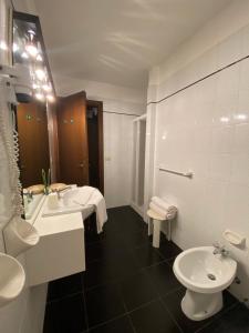 Koupelna v ubytování Albergo Aprica Garni + 8 fotografií