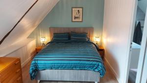 Postel nebo postele na pokoji v ubytování appartement au calme