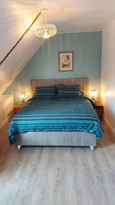 Postel nebo postele na pokoji v ubytování appartement au calme