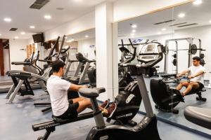 two men in the gym on tread machines at Verdi Budapest Aquincum in Budapest