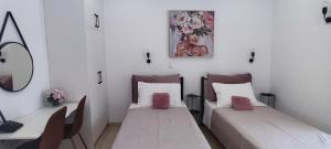 Postel nebo postele na pokoji v ubytování Happiness Apartment 6