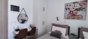 TV a/nebo společenská místnost v ubytování Happiness Apartment 6