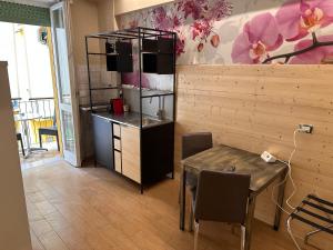 Kuchyň nebo kuchyňský kout v ubytování Rigoletto Rental Rooms