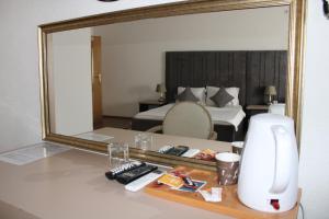Nápoje v ubytování Hotel Cleon
