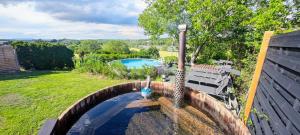 The swimming pool at or close to Kukucs Etyek Dézsafürdő Vendégház