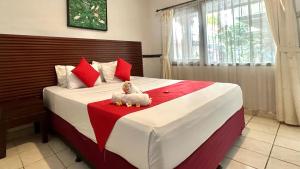 Postel nebo postele na pokoji v ubytování Abian Srama Hotel and Spa