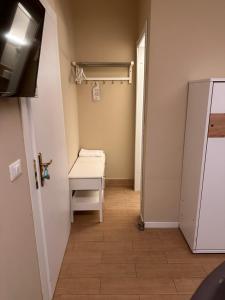 TV a/nebo společenská místnost v ubytování Rigoletto Rental Rooms