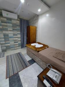 Voodi või voodid majutusasutuse فندق كايرو زد-cairo zed hotel toas