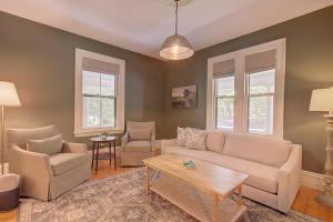 a living room with a couch and two chairs and a table at Chic Home Short Drive to Gray's Beach in Yarmouth +37 photos