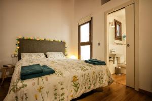 Ένα ή περισσότερα κρεβάτια σε δωμάτιο στο Iconic by Unik Vacation