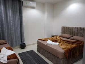 Voodi või voodid majutusasutuse فندق كايرو زد-cairo zed hotel toas