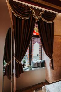 Łóżko lub łóżka w pokoju w obiekcie Apartament Shahrazad