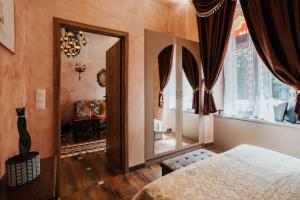 Łóżko lub łóżka w pokoju w obiekcie Apartament Shahrazad