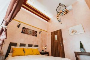 Łóżko lub łóżka w pokoju w obiekcie Apartament Shahrazad