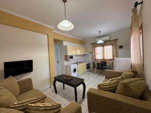 Kuchyň nebo kuchyňský kout v ubytování AURA Apartment