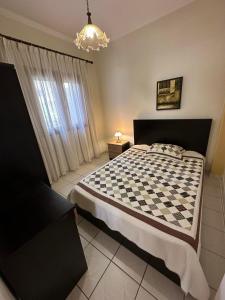 Postel nebo postele na pokoji v ubytování AURA Apartment